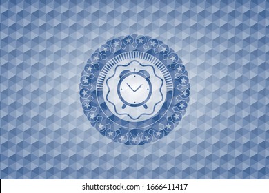 alarm clock icon inside blue emblem with geometric pattern.