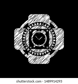 alarm clock icon inside chalk emblem written on a blackboard