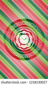 alarm clock icon inside christmas badge.