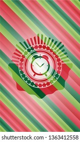 alarm clock icon inside christmas colors badge.
