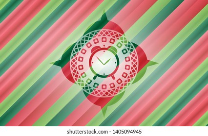 alarm clock icon inside christmas colors style emblem.