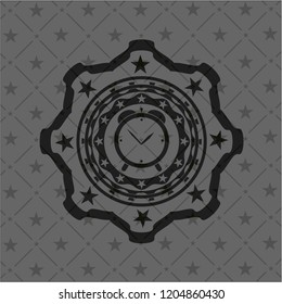 alarm clock icon inside dark emblem