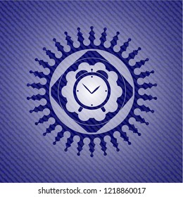 alarm clock icon inside denim background