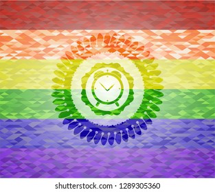 alarm clock icon inside emblem on mosaic background with the colors of the LGBT flag
