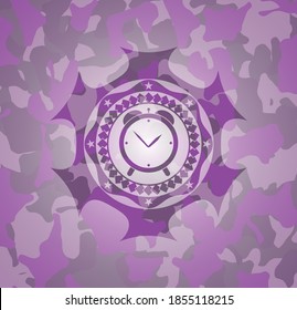 alarm clock icon inside pink and purple camo emblem. 