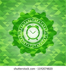 alarm clock icon inside realistic green mosaic emblem