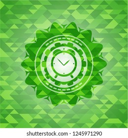 alarm clock icon inside realistic green mosaic emblem