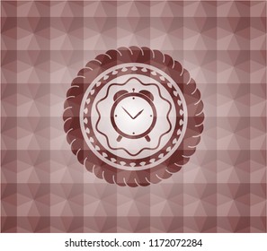 alarm clock icon inside red seamless badge with geometric pattern.
