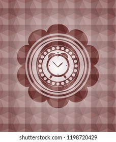 alarm clock icon inside red seamless emblem or badge with abstract geometric pattern background.