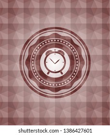 alarm clock icon inside red seamless emblem or badge with abstract geometric pattern background.