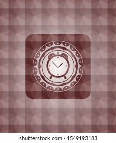 alarm clock icon inside red seamless emblem or badge with abstract geometric polygonal pattern background.