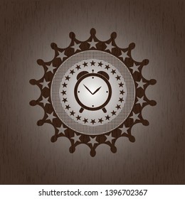 alarm clock icon inside wood emblem. Vintage.