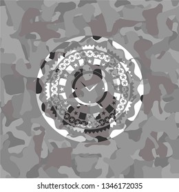 alarm clock icon on grey camo texture