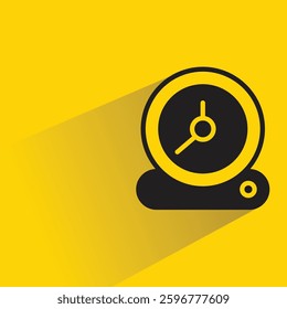 alarm clock icon on shadow yellow background