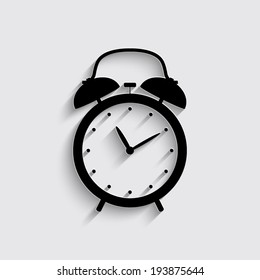 alarm clock icon with shadow on a grey background