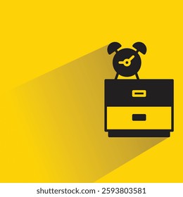 alarm clock on cabinet icon with drop shadow on yellow background