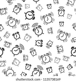 Alarm clock seamless pattern background icon. Business flat vector illustration. Clock time sign symbol pattern.