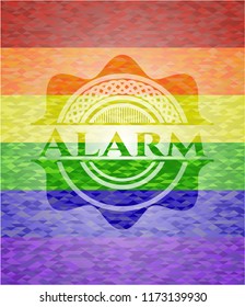Alarm emblem on mosaic background with the colors of the LGBT flag