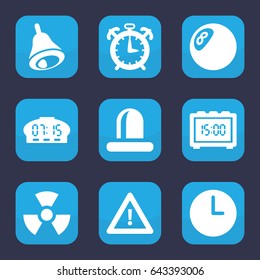 Alarm icon. set of 9 filled alarm icons such as warning, siren, bell, wall clock, digital clock, alarm, radiation