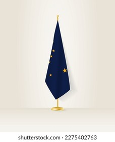 Bandera de Alaska en un puesto de bandera. Ilustración vectorial.