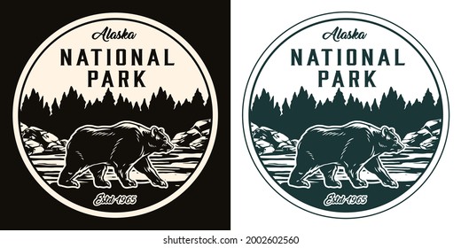 Alaska national park round monochrome label in vintage style with big bear walking on river coast on forest landscape isolated vector illustration