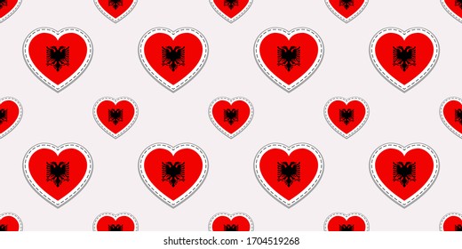 Fondo de la bandera de Albania. Etiquetas portadoras iraquíes. Me encantan los símbolos del corazón. Banderas albanesas, sin fisuras. Buena elección para páginas deportivas, viajes, elementos escolares. fondo de pantalla patriótico,