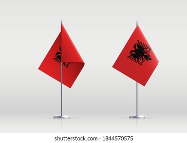 Albania flag state symbol isolated on background national banner. Greeting card National Independence Day of the Republic of Albania. Illustration banner with realistic state flag.