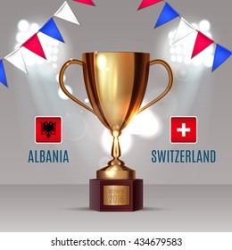 Albania flag and Switzerland flag on soccer ball on soccer background with a gold cup, this design for soccer match of group A between Albania and Switzerland in France 2016 