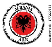 Albania grunge flag on button stamp 