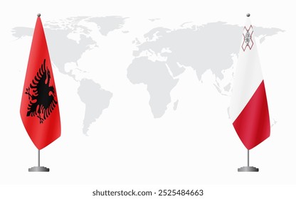 Banderas de Albania y Malta para reunión oficial con el mapa mundial como telón de fondo.