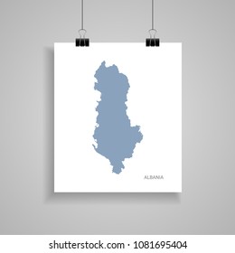 Albania map poster.  Blue vector map on piece of paper with paper clip, on a gray background. 