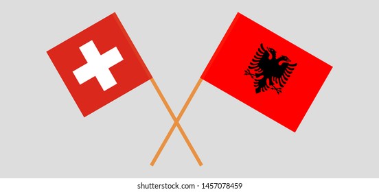 Albania and Switzerland. Crossed Albanian and Swiss flags