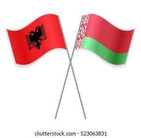 Albanian and Belarusian crossed flags. Albania combined with Belarus isolated on white. Language learning, international business or travel concept.