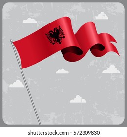 Albanian flag wavy abstract background. Vector illustration.