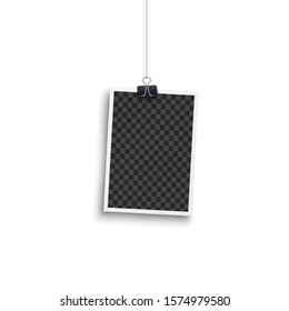 Album blank or empty photo vertical frame placed hanging on a clip mockup. Photorealistic retro card backdrop vector illustration isolated on white.