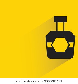 alcohol bottle with shadow on yellow background