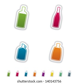 Alcohol bottles for different alcohol like a vodka and a beer. Pictured here from left to right, top to bottom: bourbon, champagne, wine, vodka.