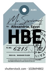 Alexandria airport luggage tag. Realistic looking tag with stamp and information written by hand. Design element for creative professionals.