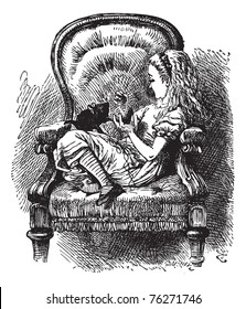 Alice talks to the Kitten - Through the Looking Glass original book vintage engraving. Do you know, I was so angry, Kitty,? Alice went on as soon as they were comfortably settled again...