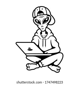alien in cap with a laptop 