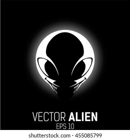 alien head with teeth illuminated by light from behind