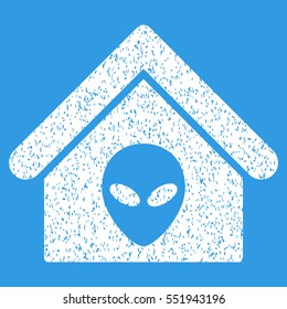 Alien Home grainy textured icon for overlay watermark stamps. Flat symbol with scratched texture. Dotted vector white ink rubber seal stamp with grunge design on a blue background.
