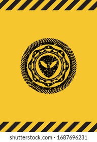 alien icon black grunge emblem, yellow warning sign. Vector Illustration. Detailed.
