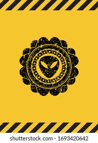 alien icon grunge black emblem with yellow background, warning sign. Vector Illustration. Detailed.