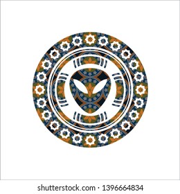 alien icon inside arabesque badge. arabic decoration.