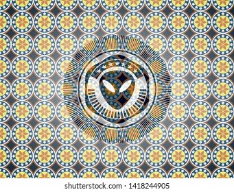 alien icon inside arabesque style badge. arabic decoration.