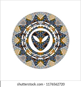 alien icon inside arabic badge background. Arabesque decoration.