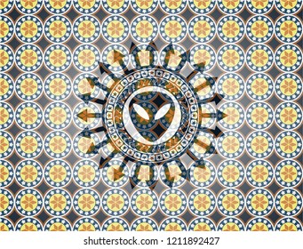 alien icon inside arabic badge. Arabesque decoration.