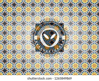 alien icon inside arabic emblem background. Arabesque decoration.