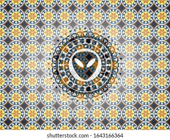 alien icon inside arabic emblem. Arabesque decoration.